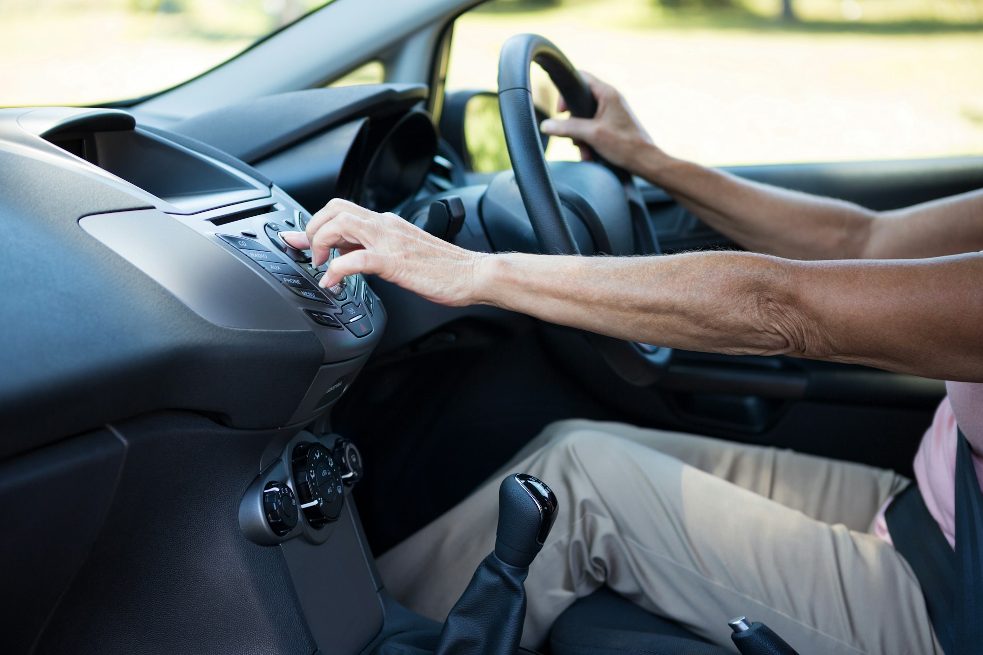 Senior woman driving a car